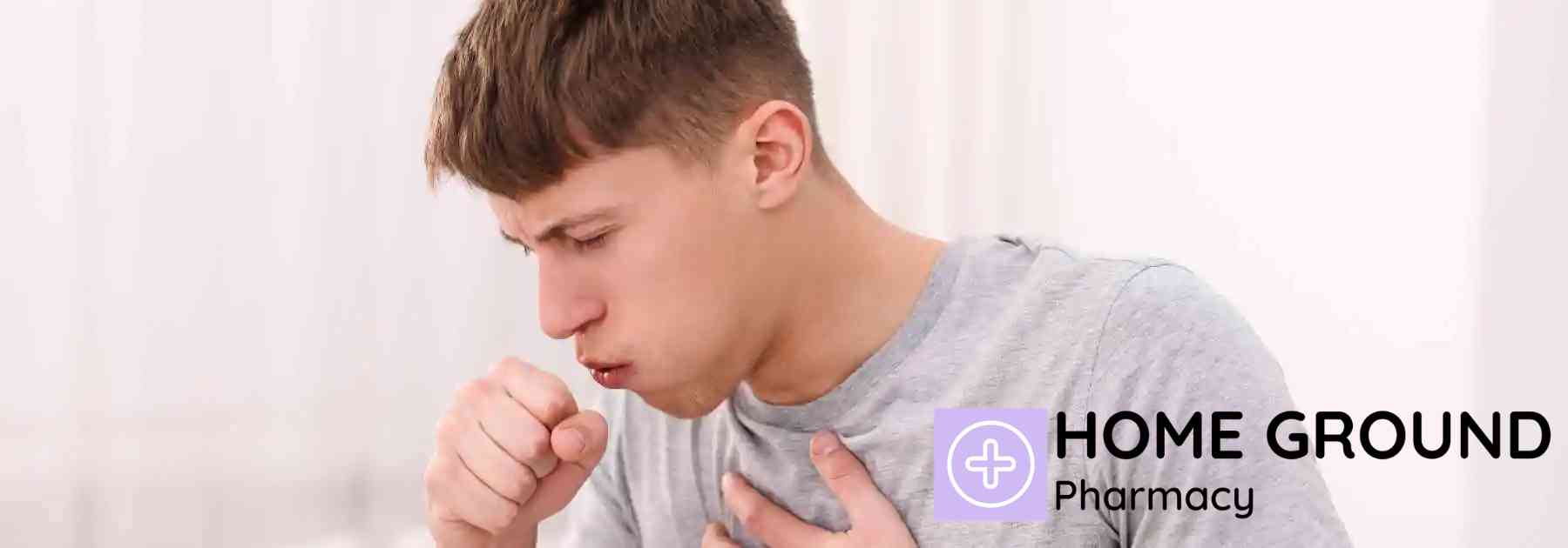 young man coughing