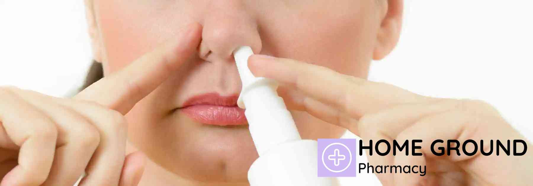 close-up of woman using nasal spray
